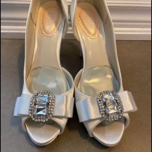 Wedding shoes. White satin. Rhinestones. Comes with gel inserts. Size 7.